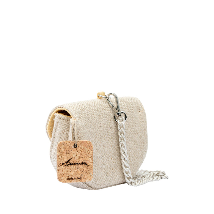 Beige textured handbag with chain strap and cork tag