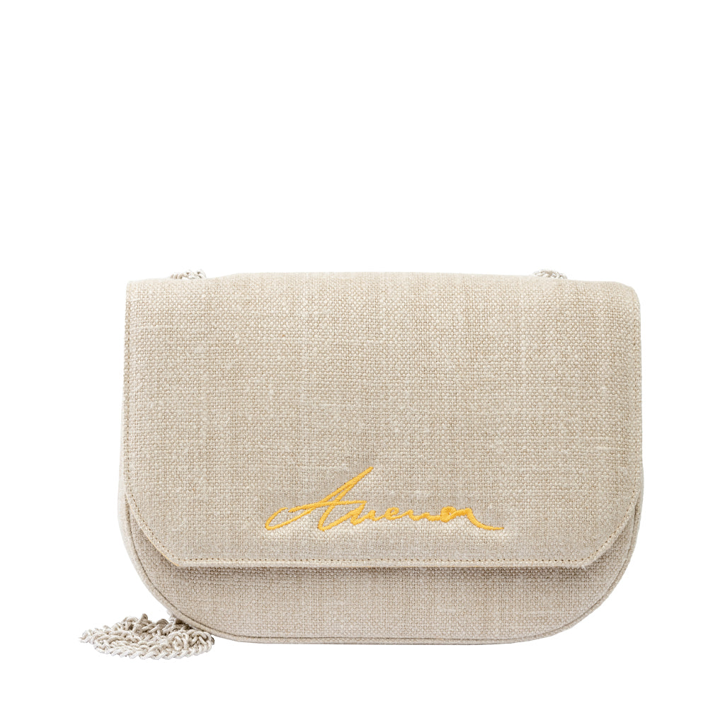 Beige crossbody bag with gold stitched signature and chain strap