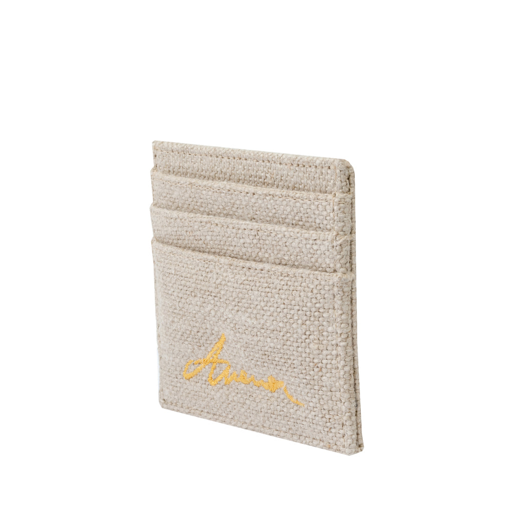 Beige woven card holder with multiple slots and yellow embroidered design