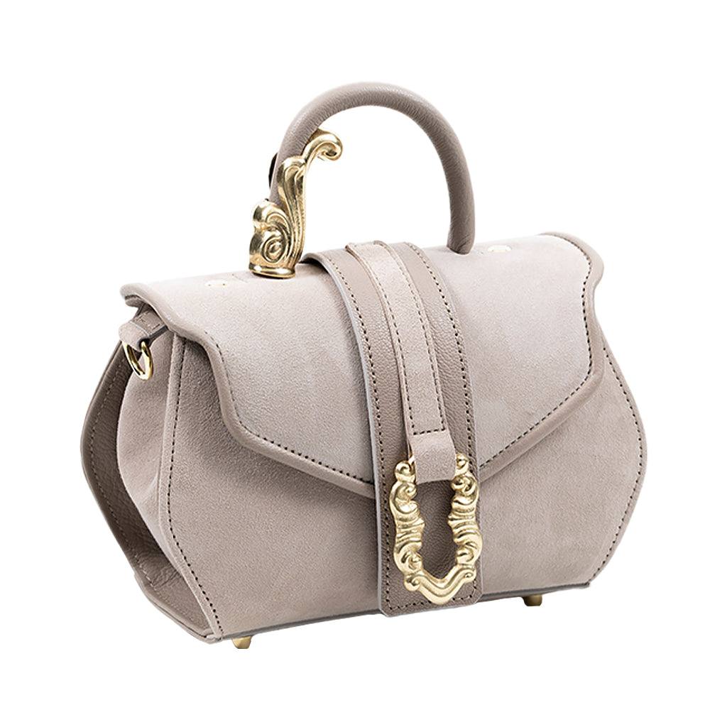 Elegant beige leather handbag with gold decorative accents and top handle