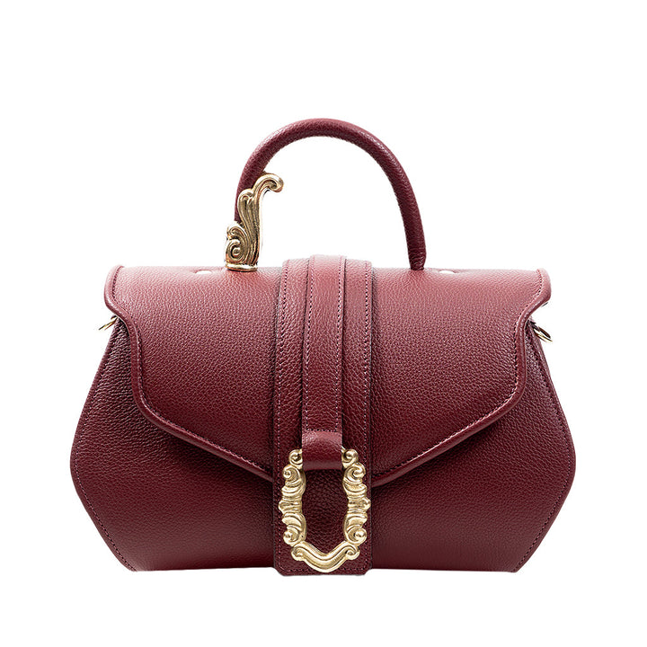 Burgundy leather handbag with gold ornate clasp and handle