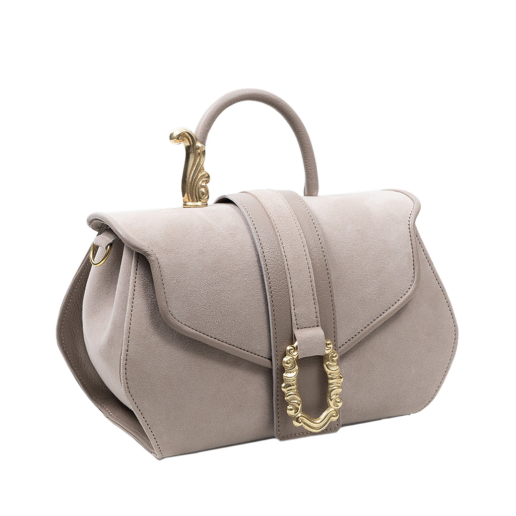 Elegant beige leather handbag with gold accents and decorative clasp