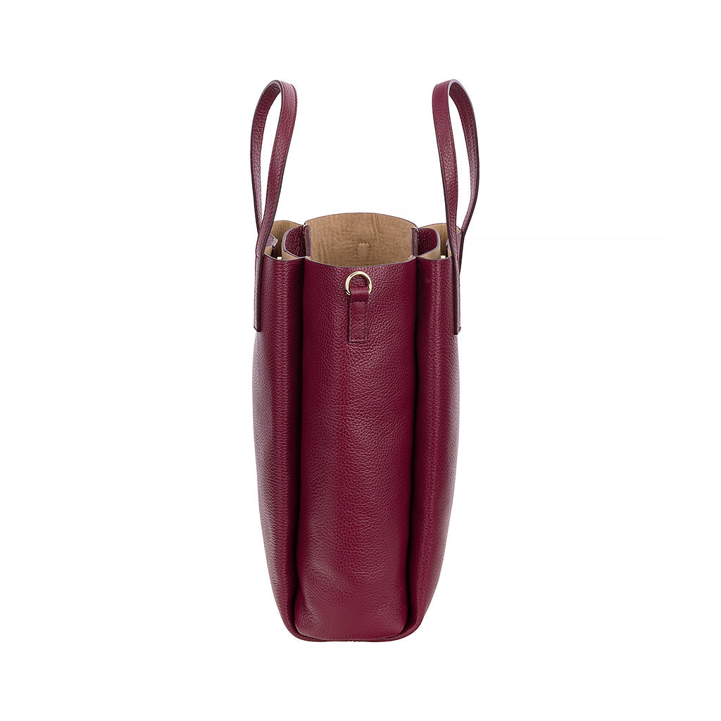 Maroon leather tote bag with long handles and minimalist design