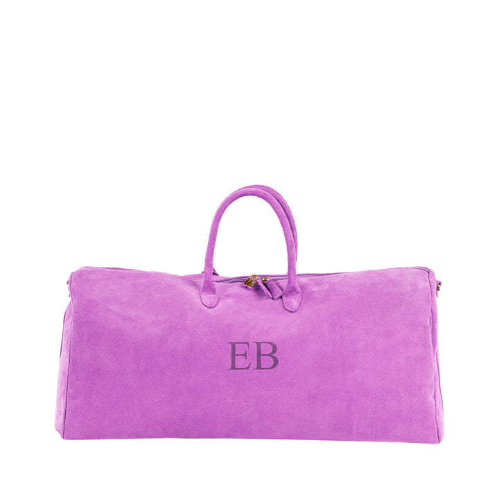 Purple suede duffel bag with 'EB' monogram and handles