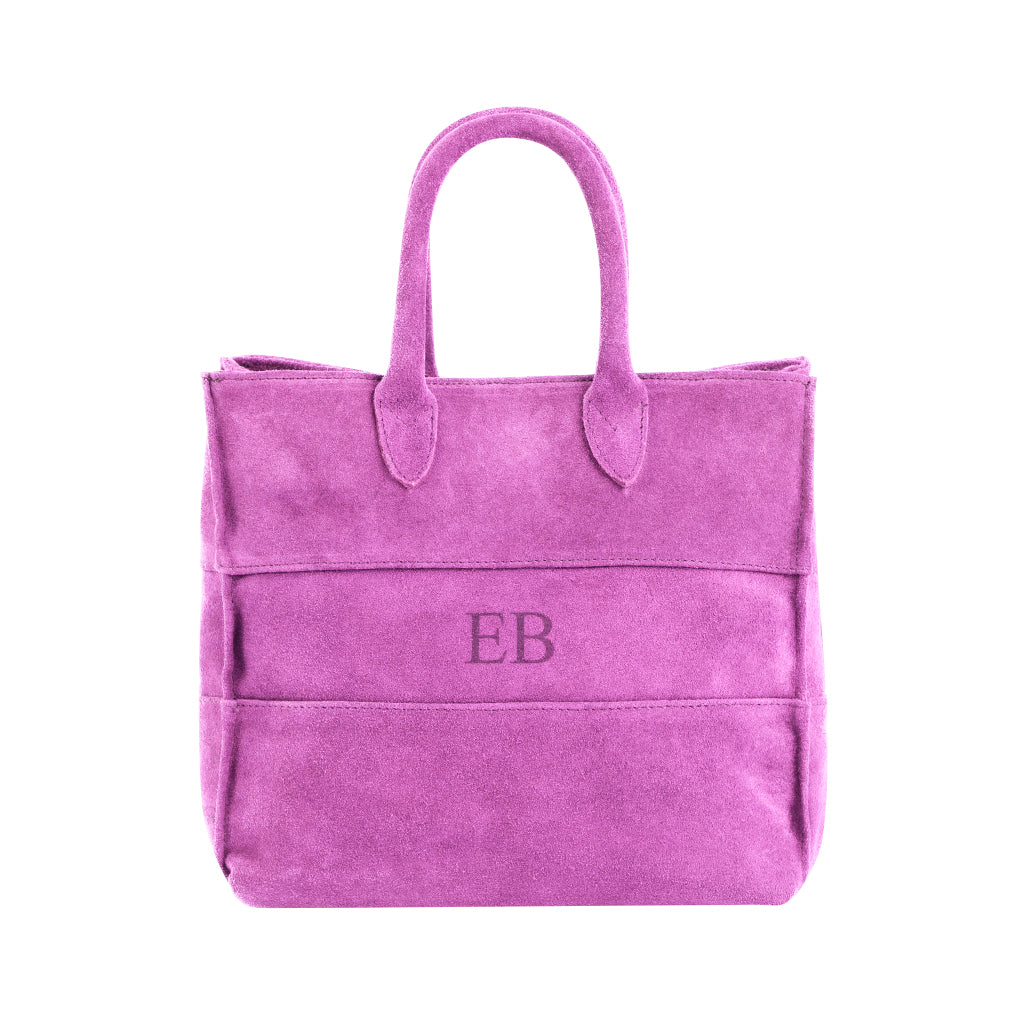 Purple suede handbag with initials EB embroidered on the front