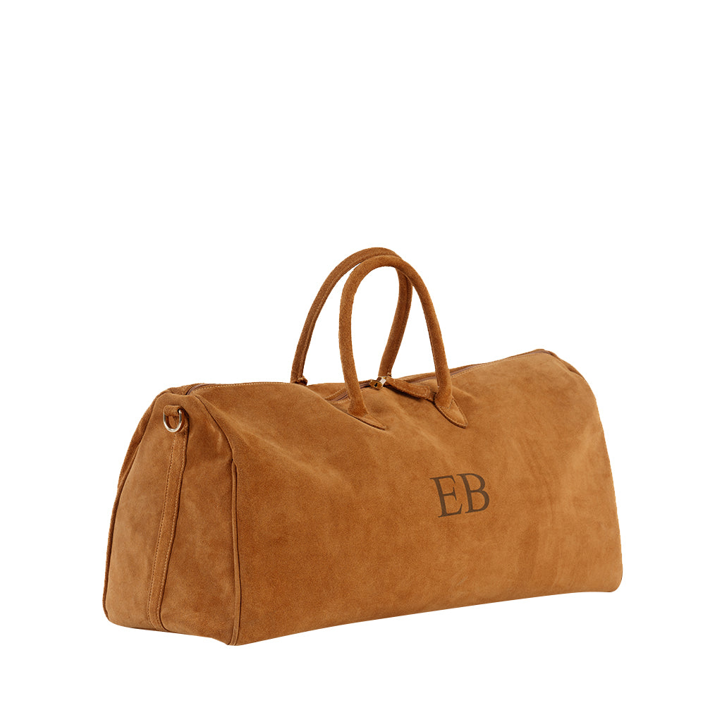 Tan suede duffel bag with initials EB monogram