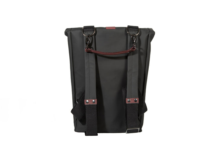 Black waterproof backpack with front buckle straps and leather details