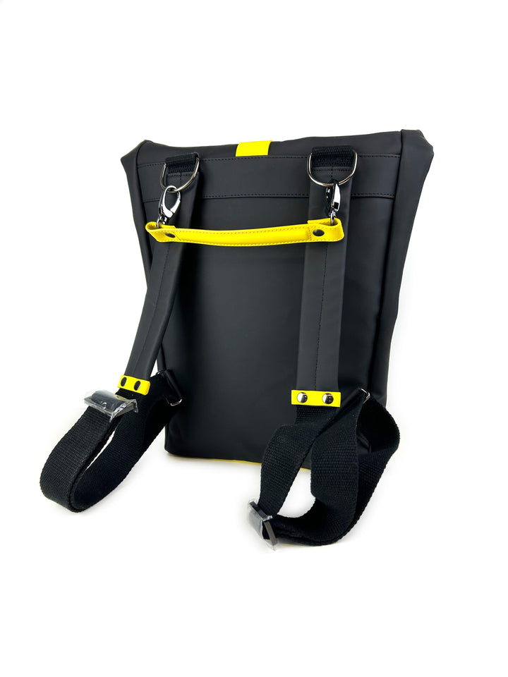 Black and yellow backpack with adjustable straps and multiple compartments