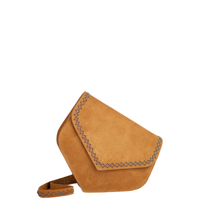 Tan suede shoulder bag with triangular flap and decorative stitching