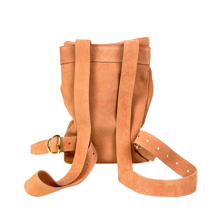 Tan suede backpack with adjustable straps and gold buckle