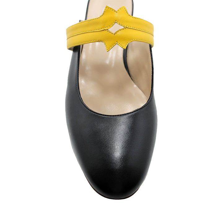 Black and yellow designer leather shoe with unique strap detail