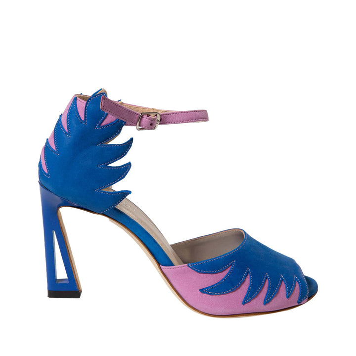 Bold blue and pink high-heeled sandal with ankle strap and wave pattern design