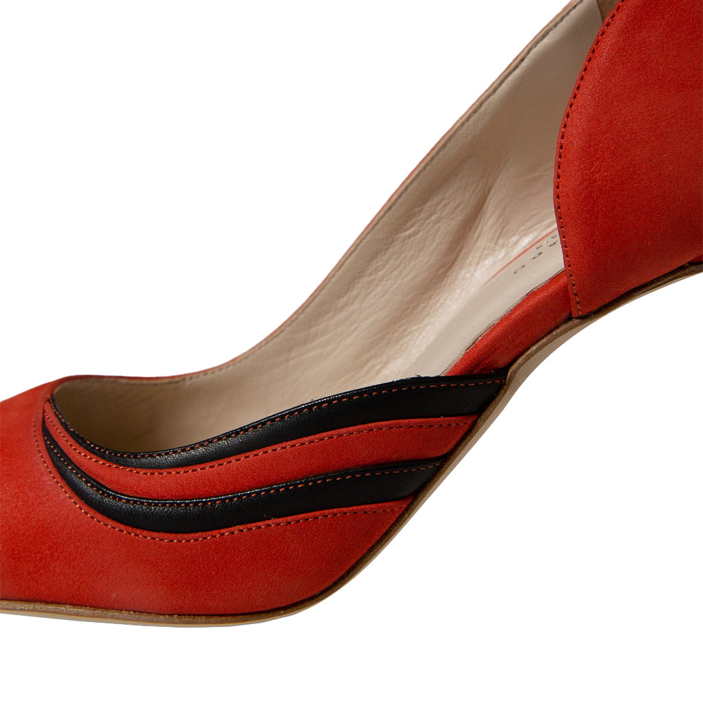 Red high heel shoe with black stripe detail