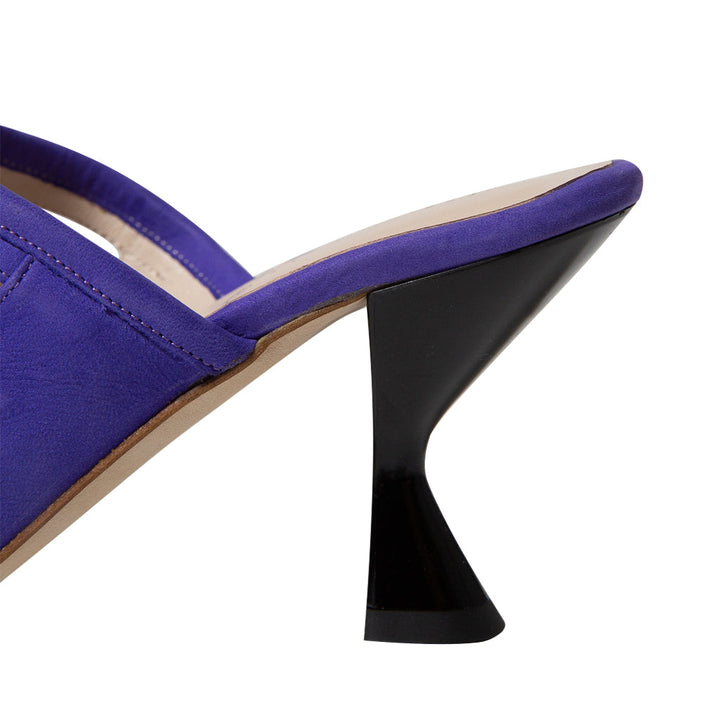 Purple high heel shoe with black geometric heel design