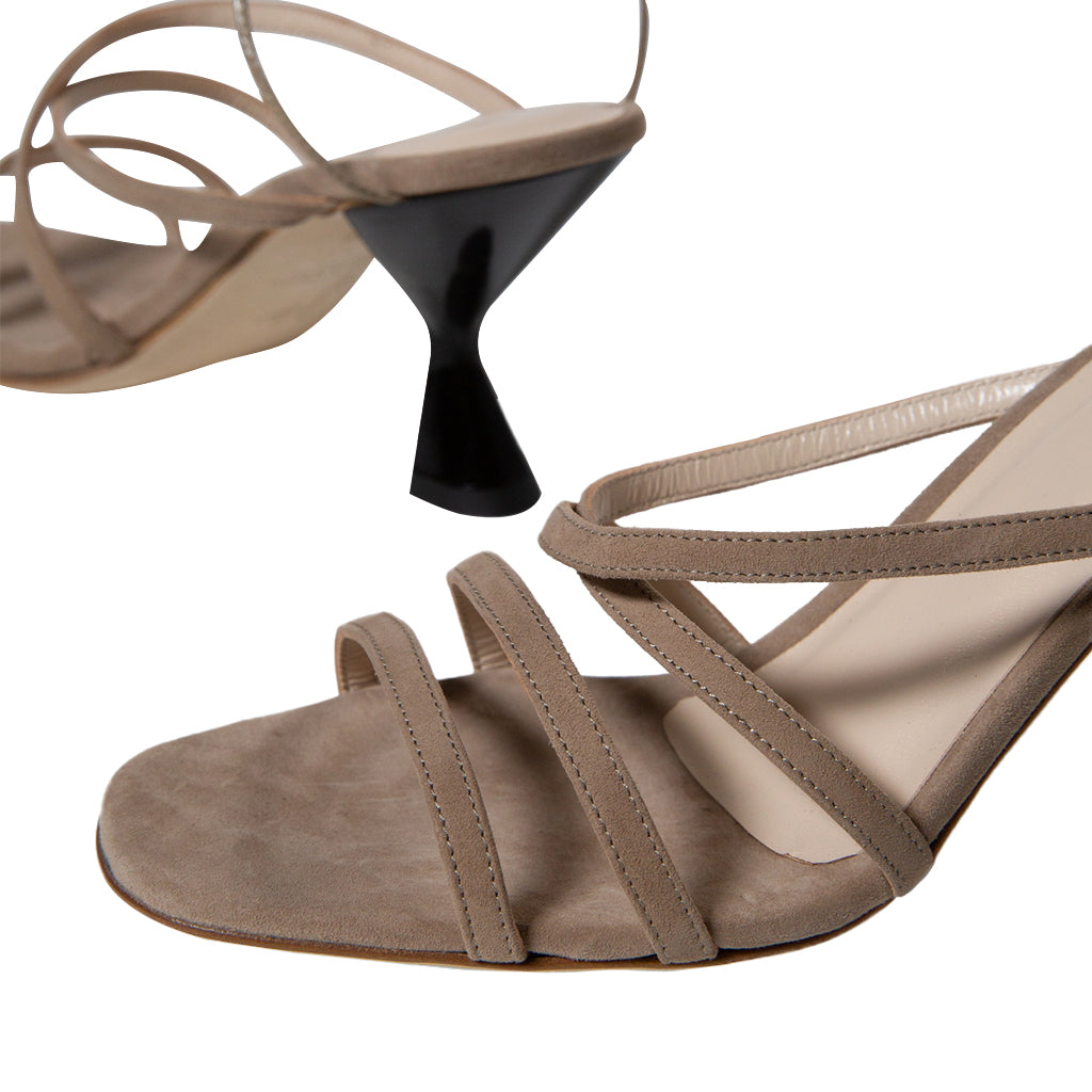 Strappy beige high heel sandal with unique black cone-shaped heel