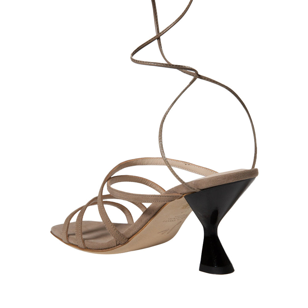 Elegant taupe high-heeled strappy sandal with unique geometric heel design