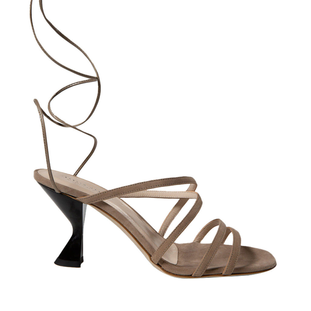 Elegant brown strappy high-heel sandal with unique heel design