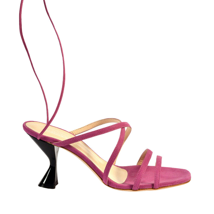 Elegant pink strappy high-heeled sandal with black heel