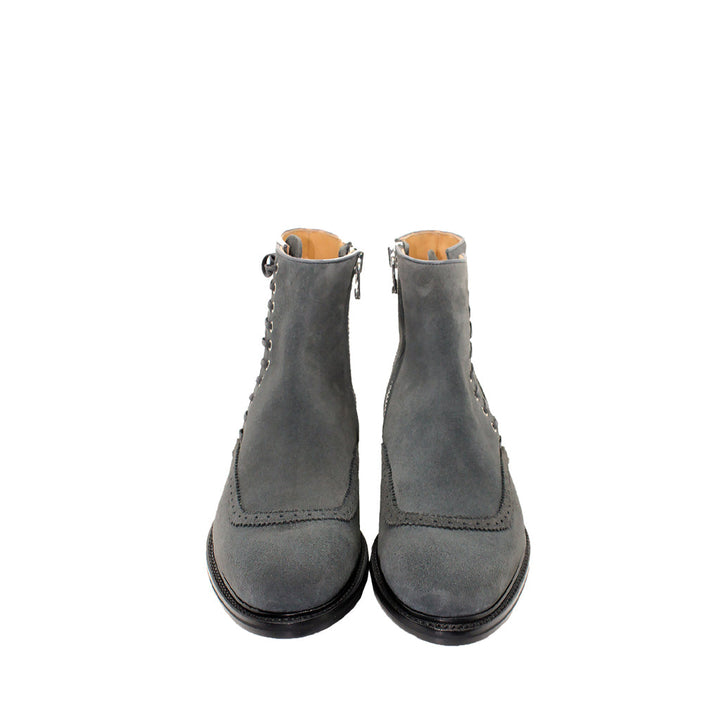 Gray suede ankle boots with front lace-up and side zipper closure