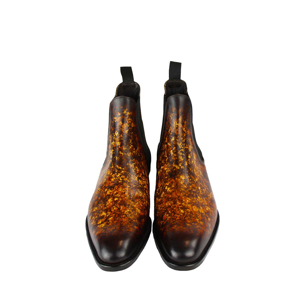 Brown leather Chelsea boots with unique marbled design