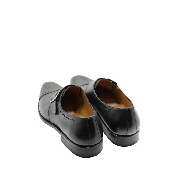 Black leather dress shoes with buckles, rear view