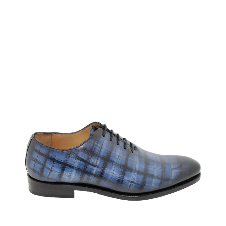 Men's blue plaid dress shoe with black laces and leather sole