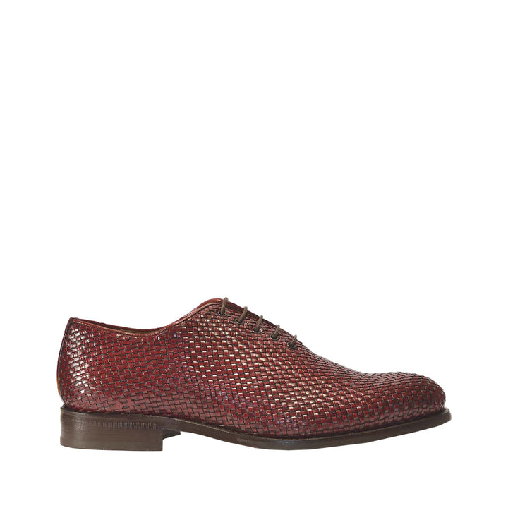 Maroon woven leather dress shoe with brown sole and laces