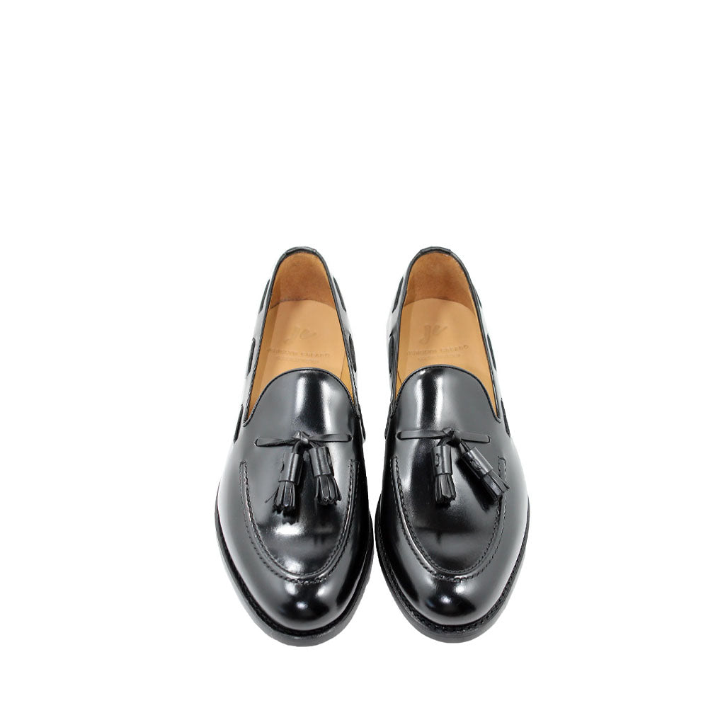 Black leather tassel loafers