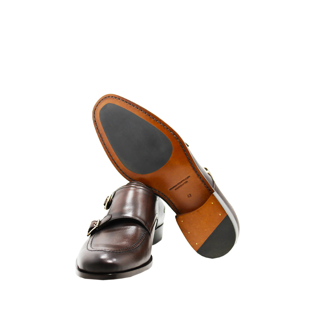 Men's brown leather double monk strap dress shoes with rubber sole, displayed bottom and side view