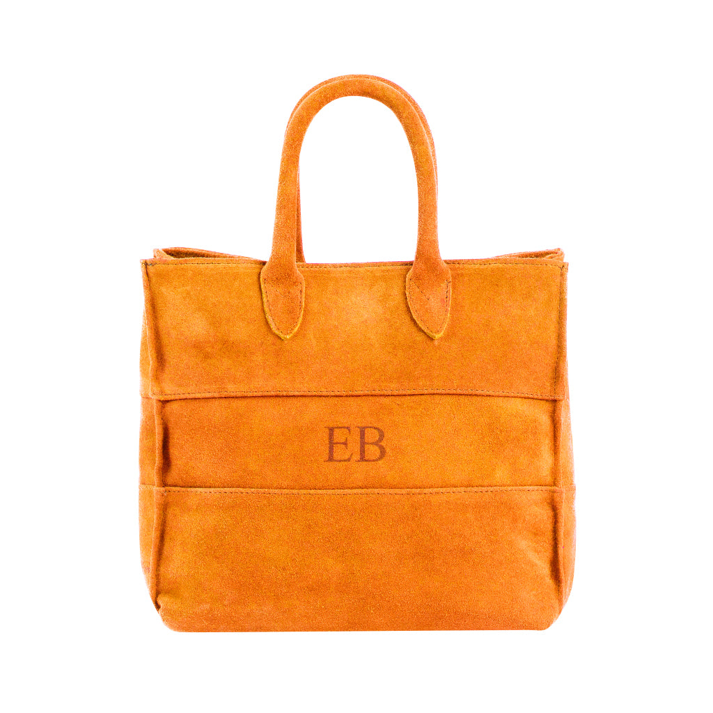 Orange suede handbag with initials 'EB' embossed on the front