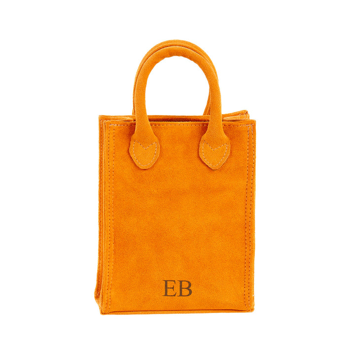 Bright orange suede mini tote bag with initials 'EB' on the front