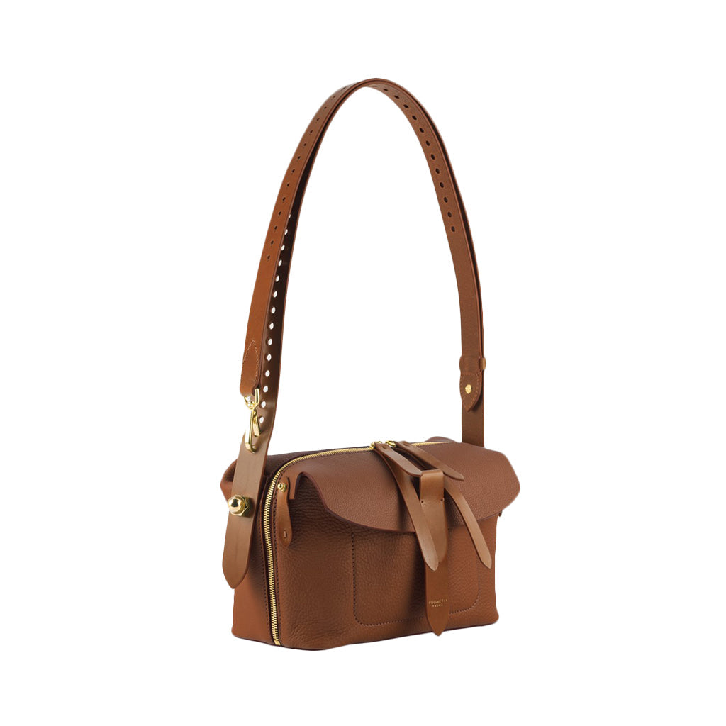 Brown leather crossbody bag with gold hardware and adjustable strap