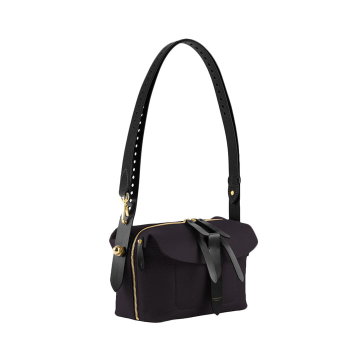 Elegant black leather handbag with adjustable shoulder straps and gold accents