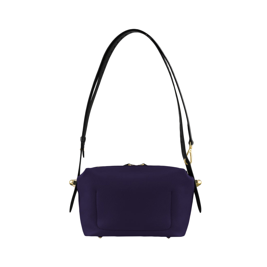 Navy blue shoulder bag with black strap and gold accents