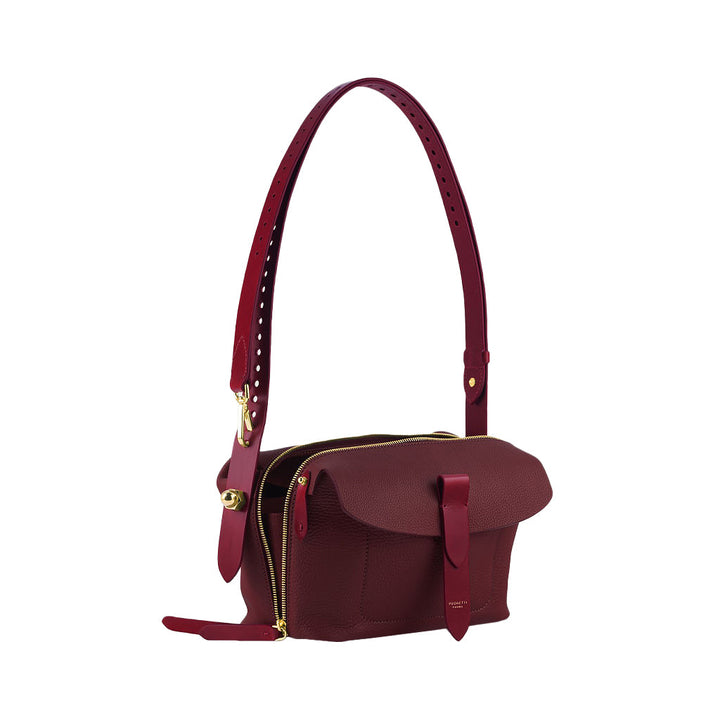 Stylish maroon leather shoulder bag with adjustable strap and gold hardware