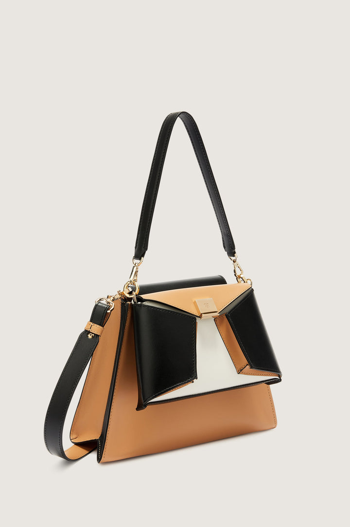 Stylish brown, black, and white womenâ€™s handbag with shoulder strap