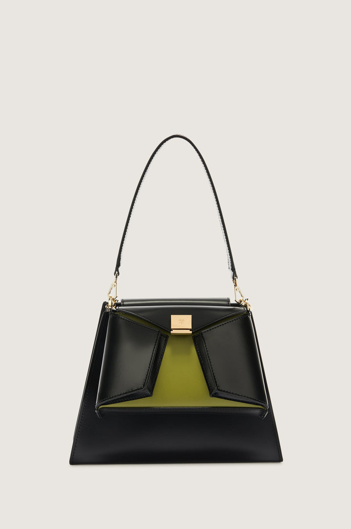 Black leather handbag with green suede detailing and gold hardware