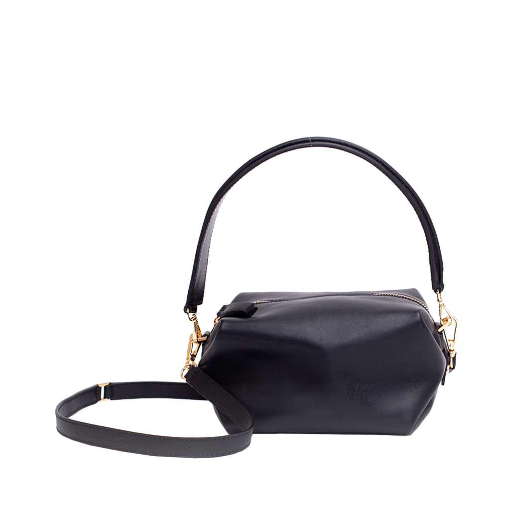 Elegant black leather handbag with gold hardware and adjustable strap