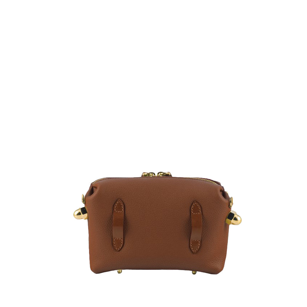 Brown leather handbag with gold hardware and dual handle detailing