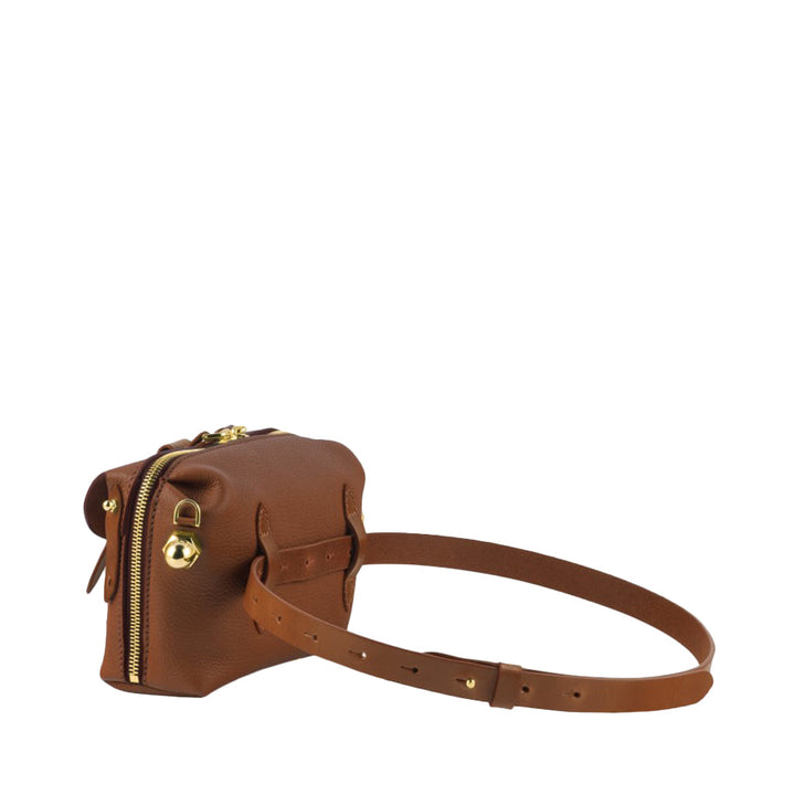 Brown leather crossbody bag with gold zippers and adjustable strap