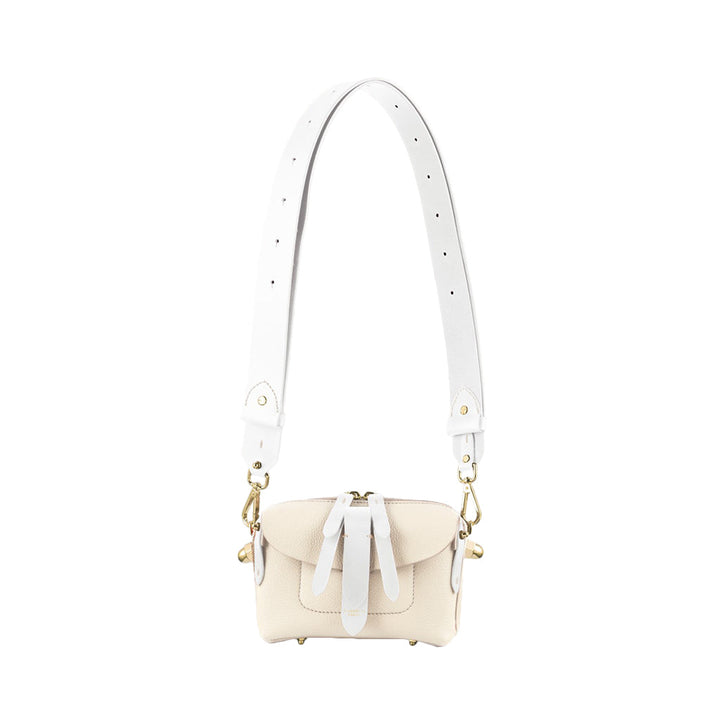 Cream and white leather shoulder bag with adjustable strap and gold hardware