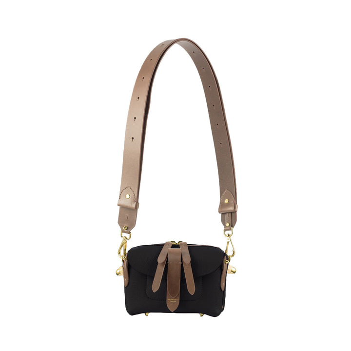 Black leather crossbody bag with brown adjustable strap and gold hardware