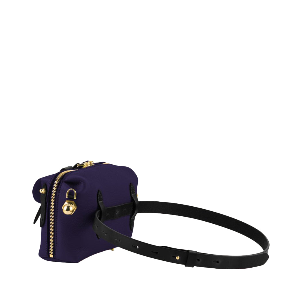 Purple mini shoulder bag with gold zippers and black adjustable strap