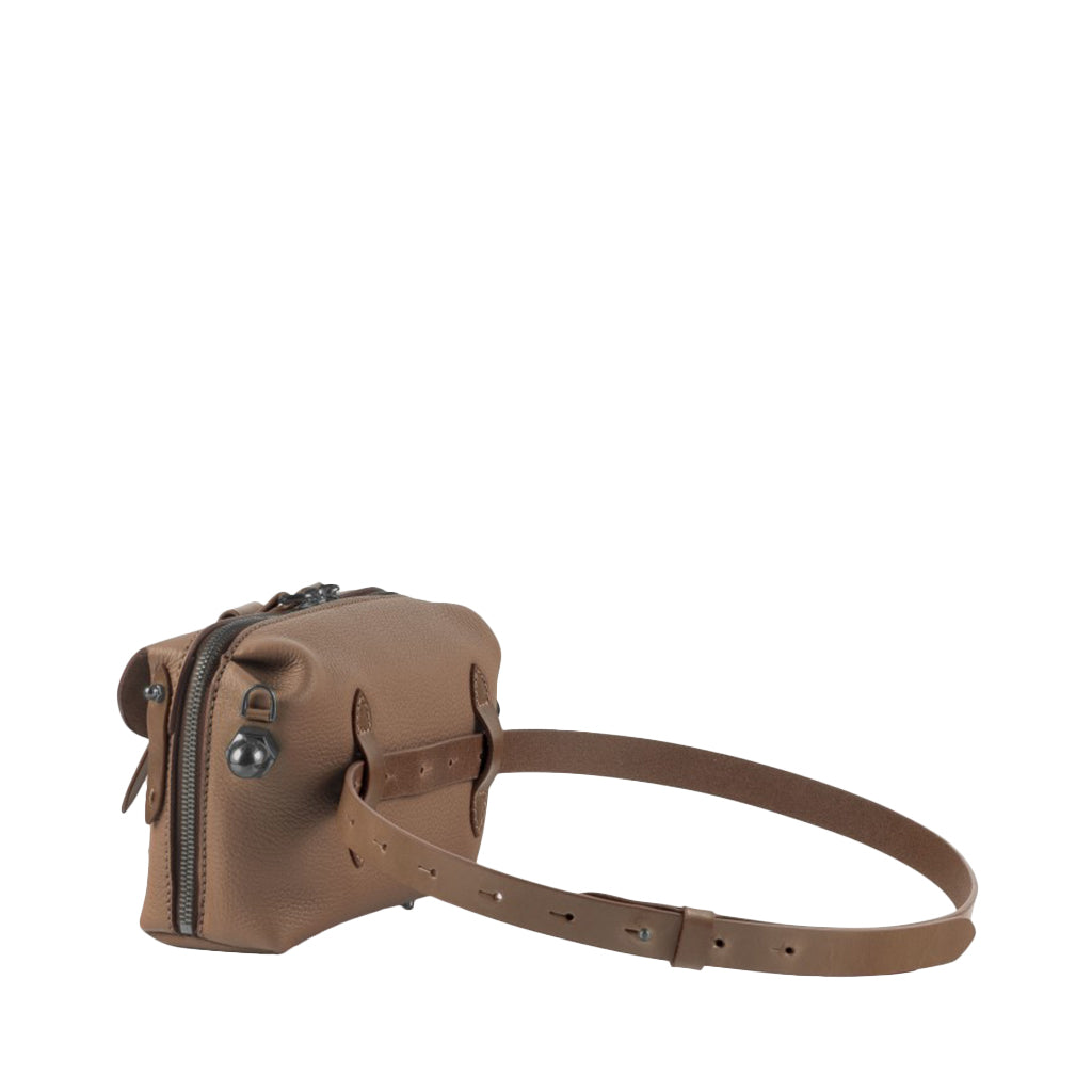 Brown leather crossbody bag with adjustable strap and metal zippers