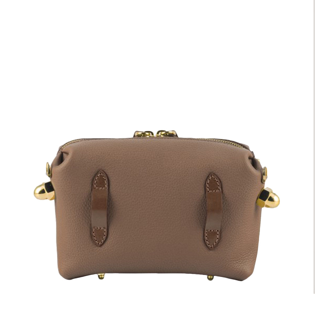 Brown leather handbag with gold accents and zipper closure