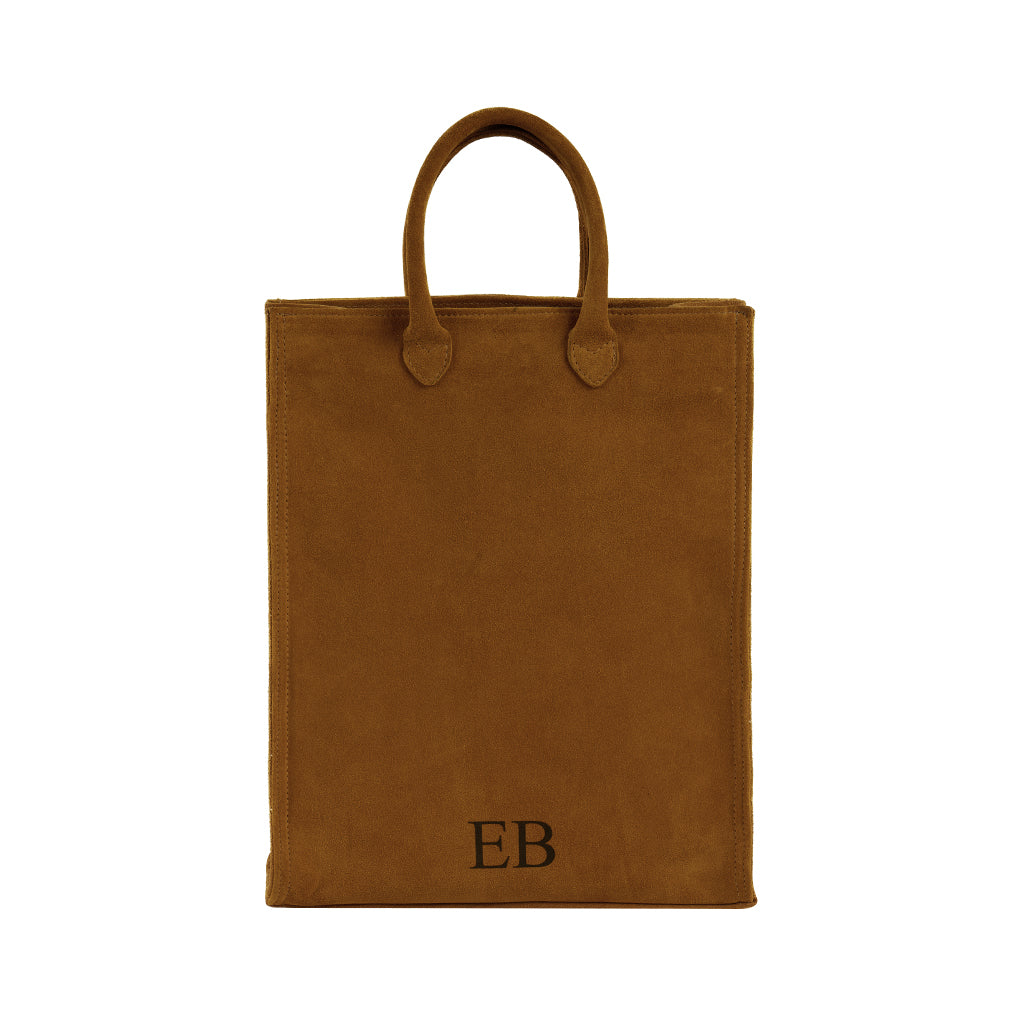 Brown suede tote bag with 'EB' initials embossed on the bottom corner