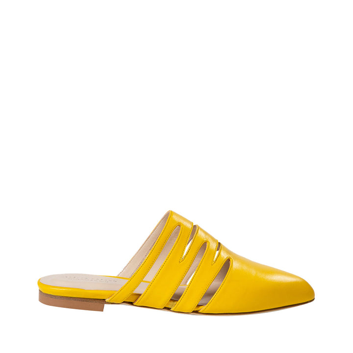 Yellow slip-on mule shoe with cut-out straps and flat sole