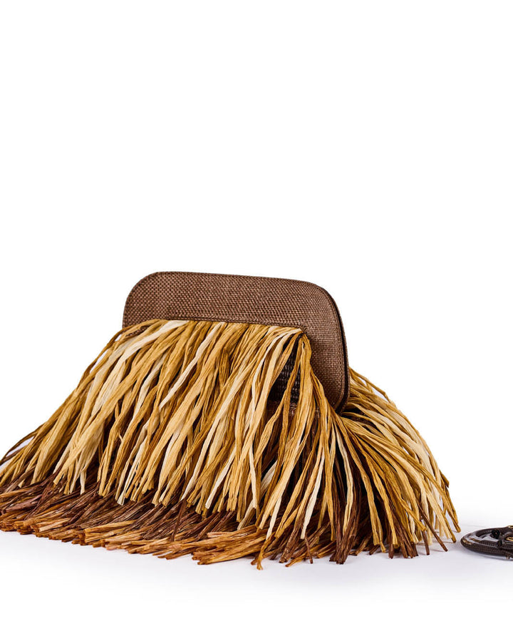 Brown clutch bag with fringed raffia design on a white background