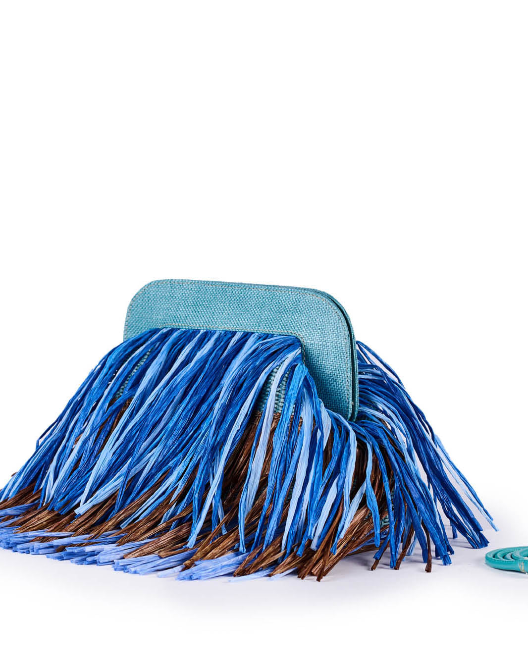 Blue handcrafted fringed handbag with unique design against white background