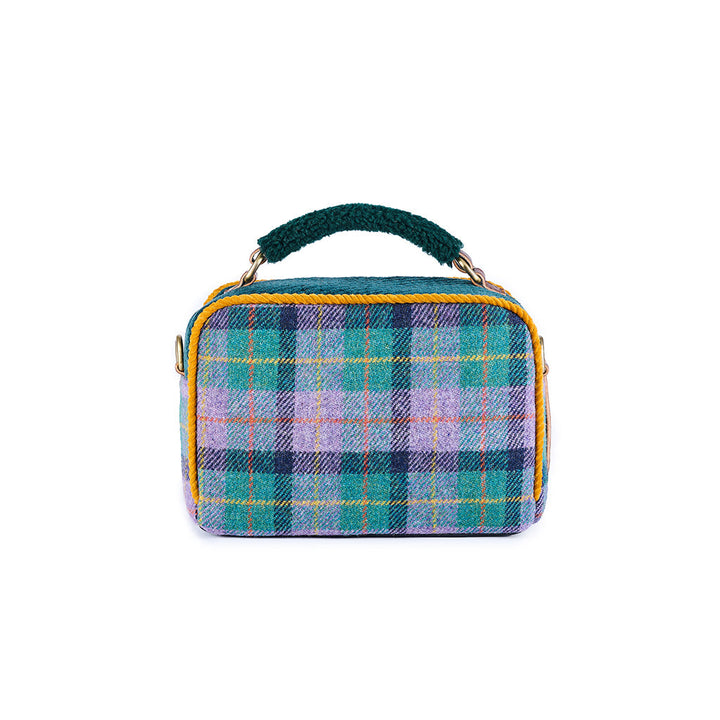 Colorful plaid handbag with green handle and yellow trim